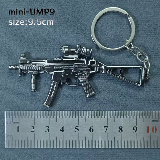 BRELOK UMP9 BROŃ METAL